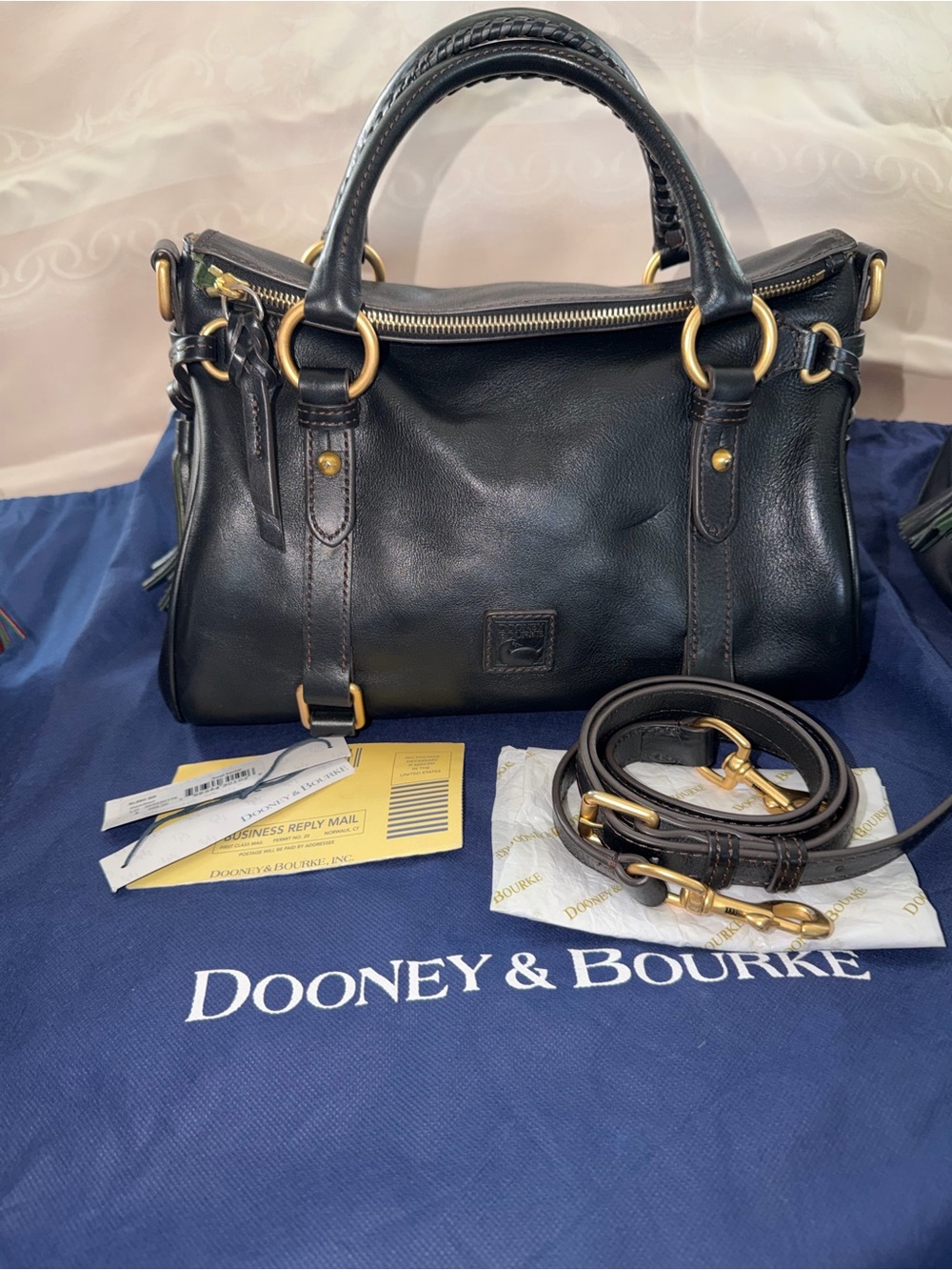 Dooney & Bourke Black Leather Satchel with Gold Hardware and Detachable Strap